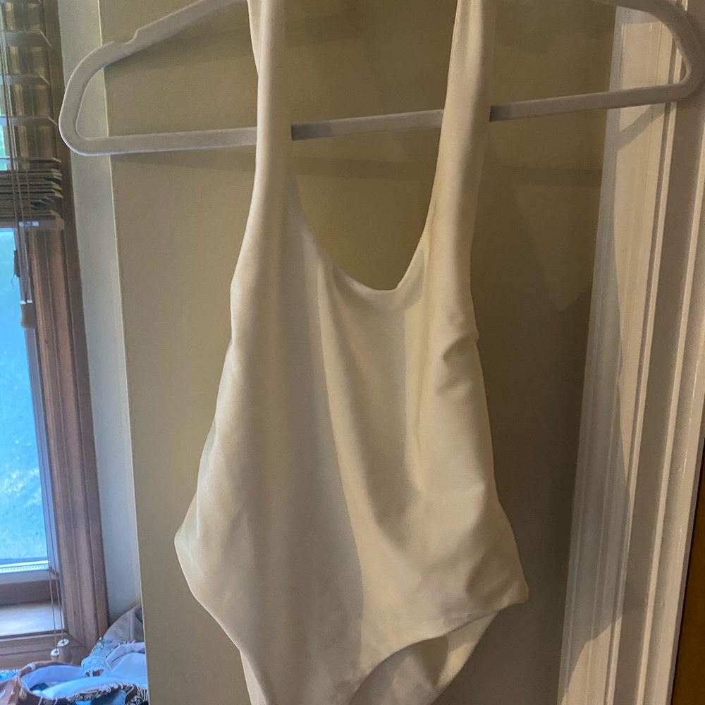 Halter white tiger mist bodysuit.Can attach jewels
